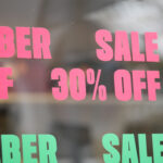 A sale sign shows thirty percent off for members at a store.