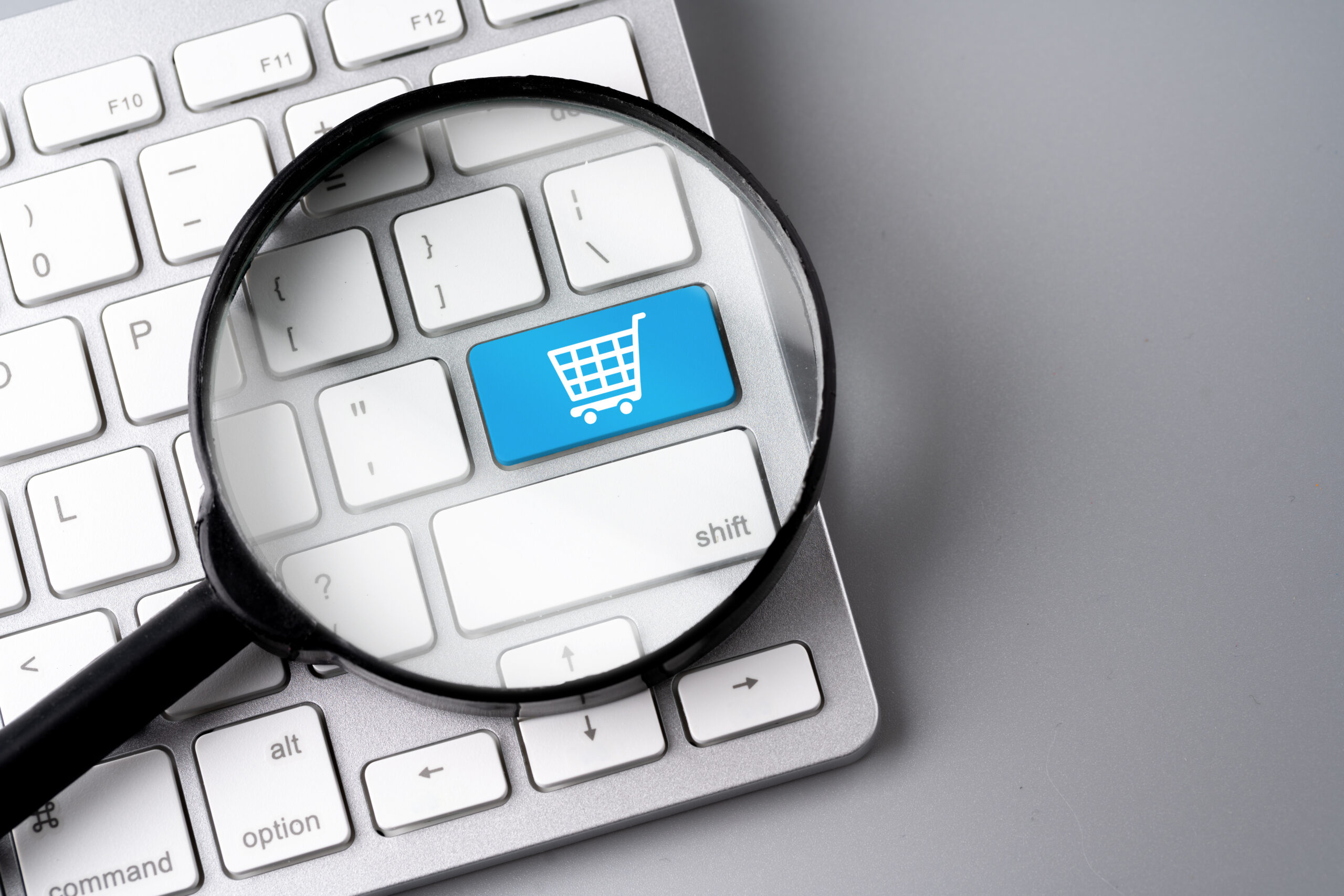 Online shopping & business icon on retro computer keyboard