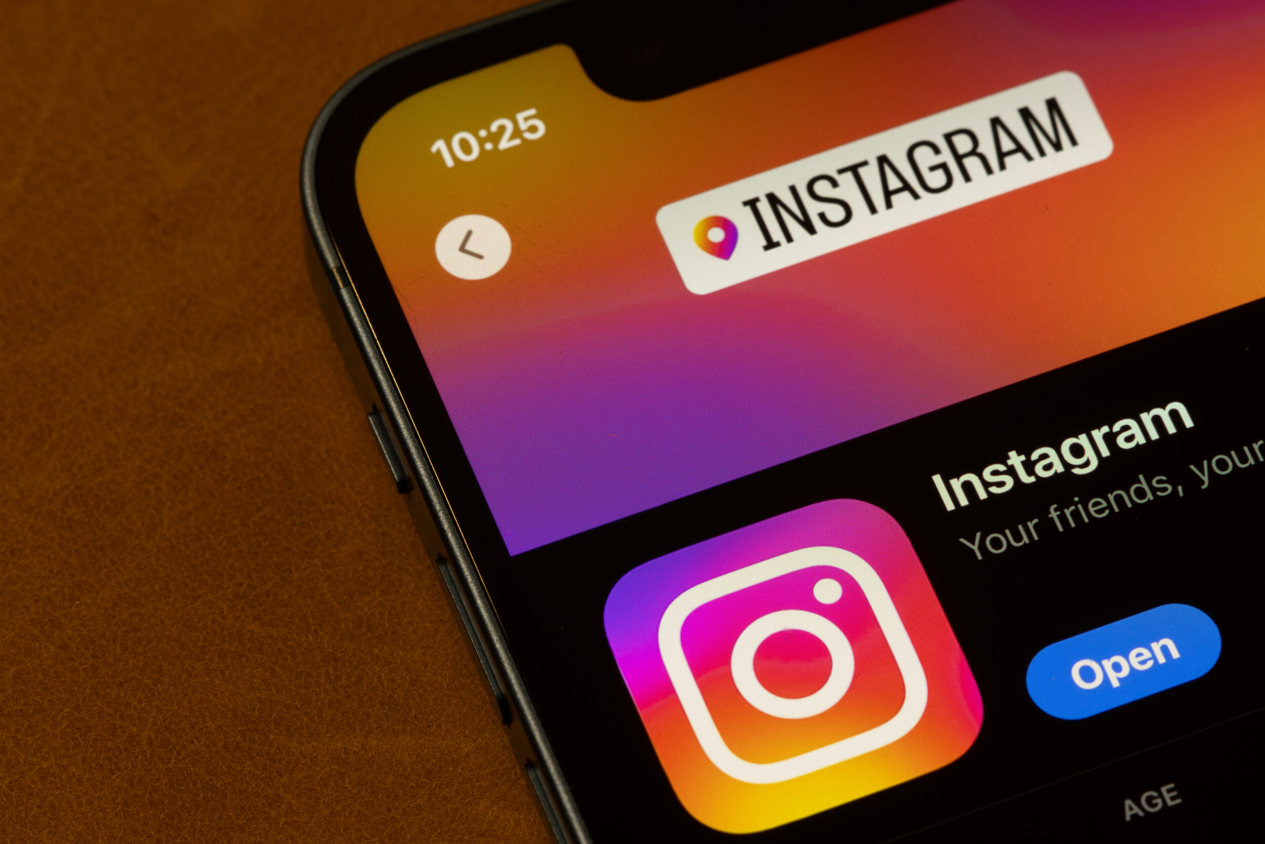 Instagram app is seen in the App Store on the screen of an iPhone.