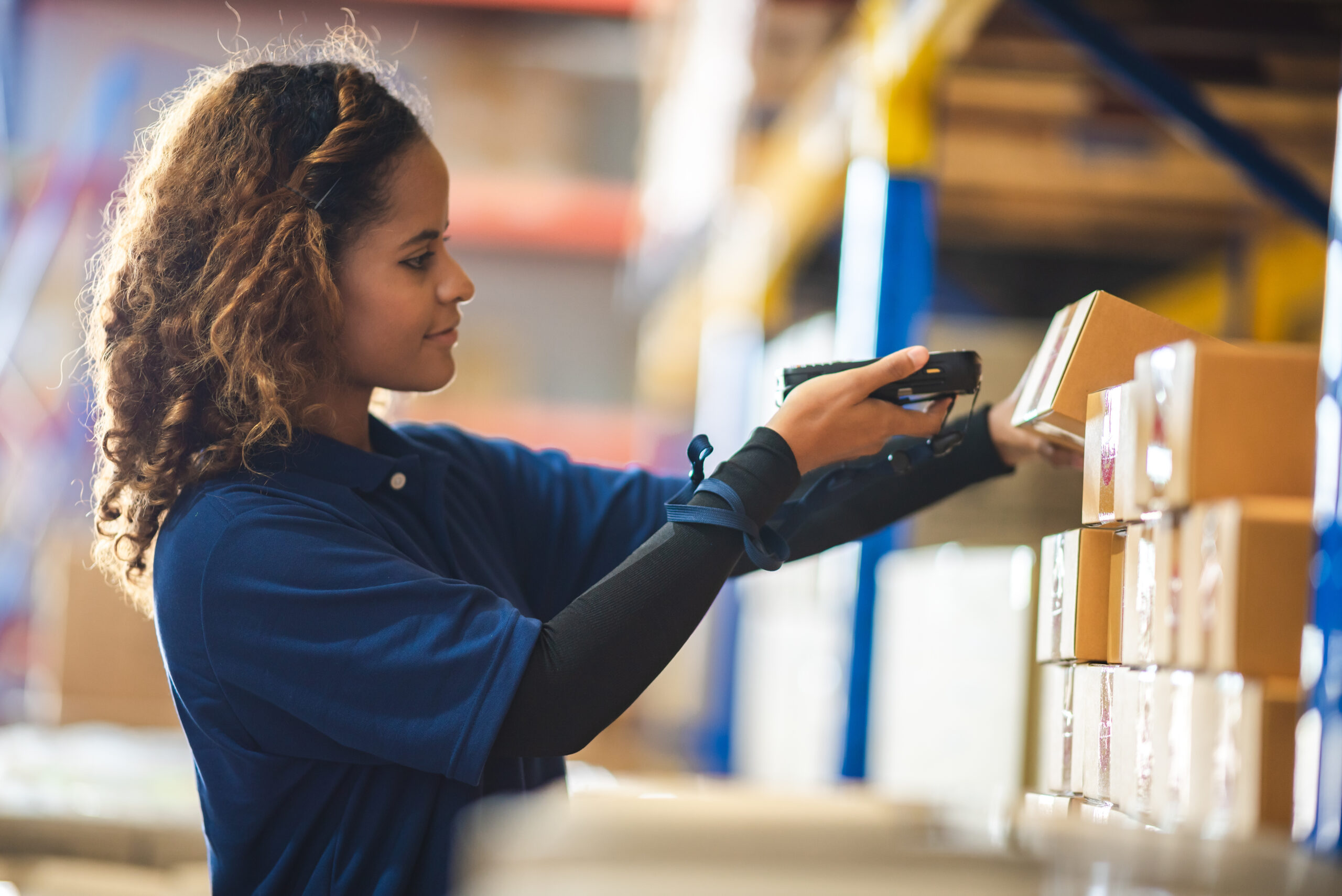 woman in inventory warehouse factory
